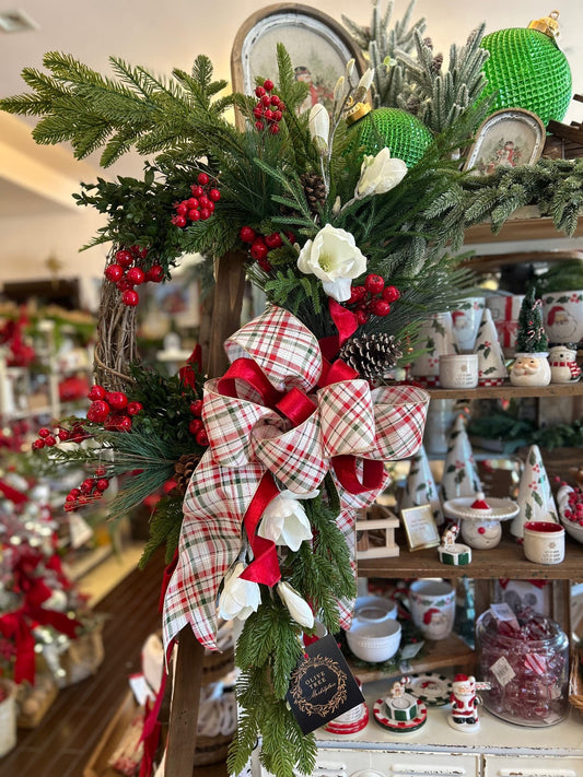 Custom berry magnolia wreath with plaid bow, pine cones, red berries, white flowers
