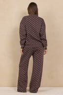 Brown polka dot fleece mockneck top and matching wide-leg pants set, back view