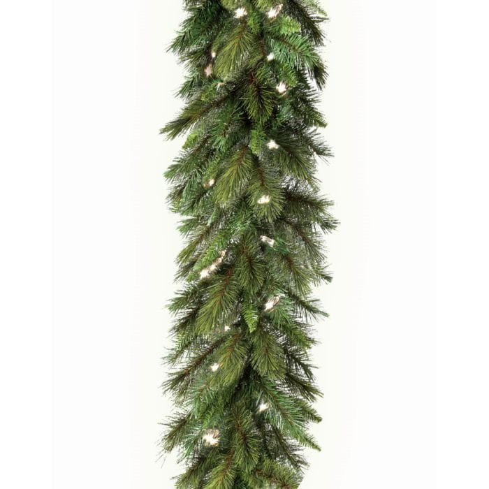 Pre-lit artificial pine garland with warm white lights on a clean white background