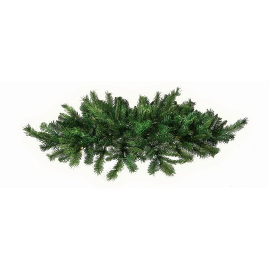 Artificial pine centerpiece swag with dense green branches spreading horizontally, top view