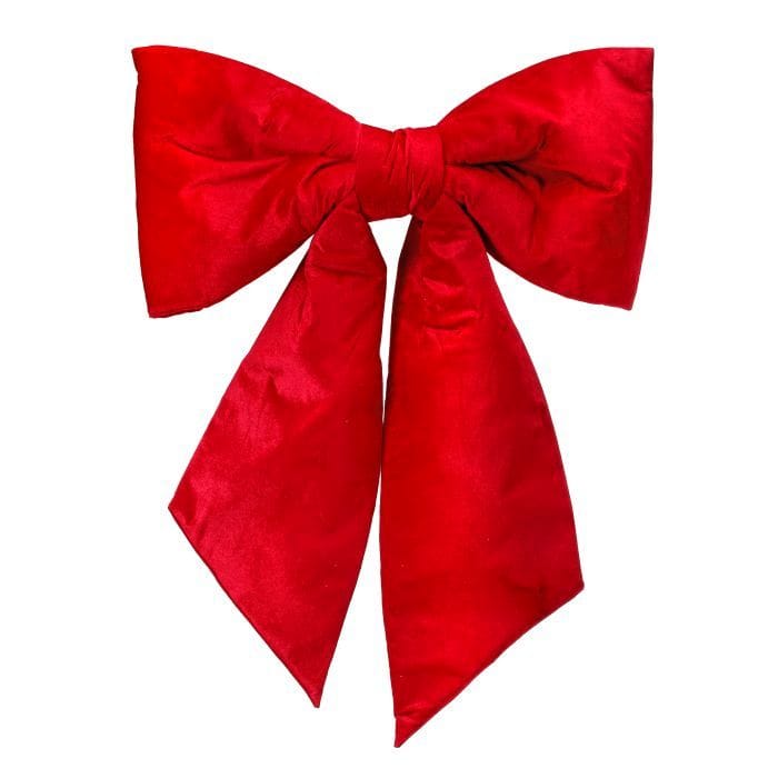 Large red velvet decorative bow with two loops and trailing tails, front view