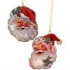 Two vintage-style metal Santa face Christmas ornaments with rosy cheeks and white beard