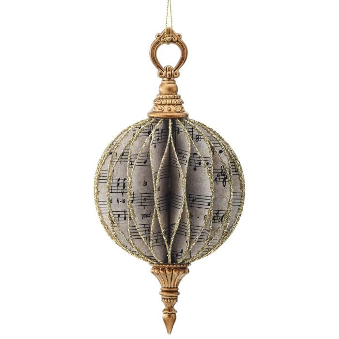 Vintage-style round finial ornament with sheet music print and gold glitter trim, hanging view