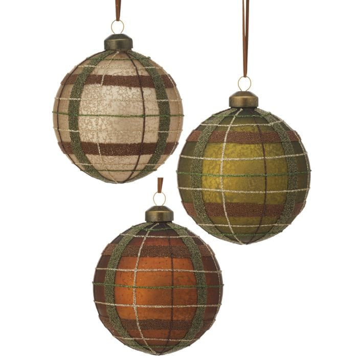 Three matte glass ball ornaments with plaid pattern in earth tones, hanging by ribbon loops