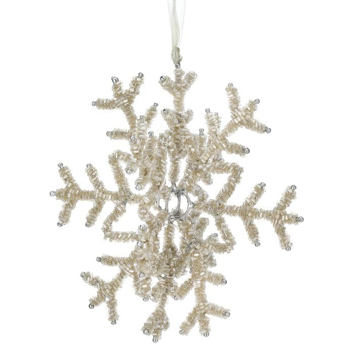 Beaded snowflake ornament with pearl and silver beads, hanging from a ribbon, front view