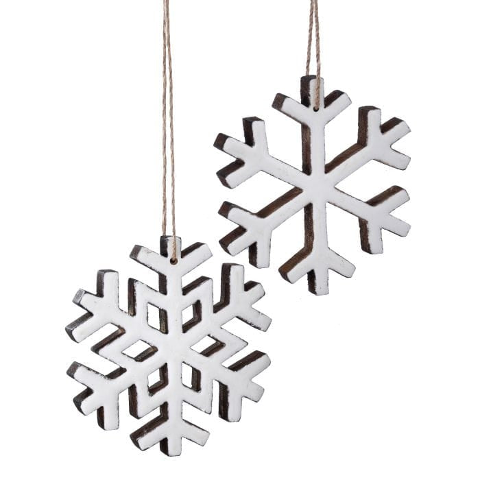 Two wooden snowflake ornaments with white enamel finish and twine hangers, front view