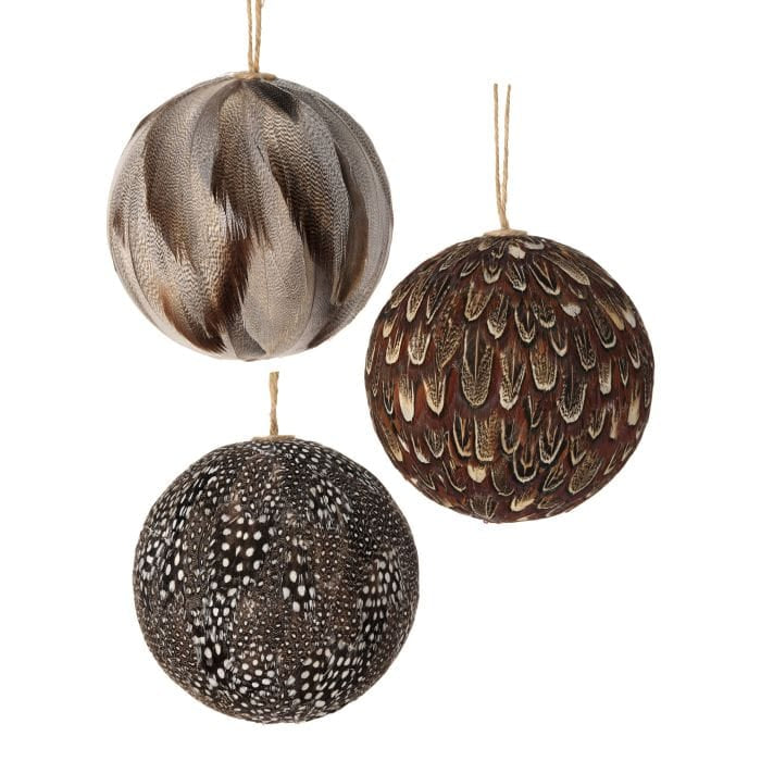 Three decorative feather-covered ball ornaments with jute twine hangers in natural brown and black patterns