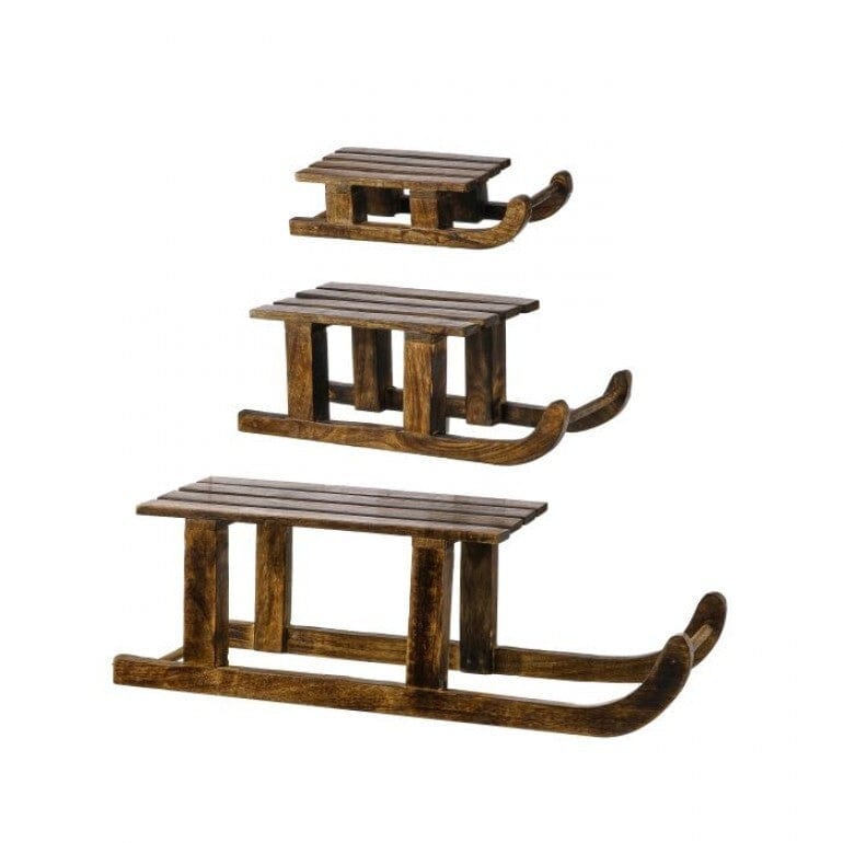 Set of three rustic dark brown mango wood decorative sleds in graduated sizes