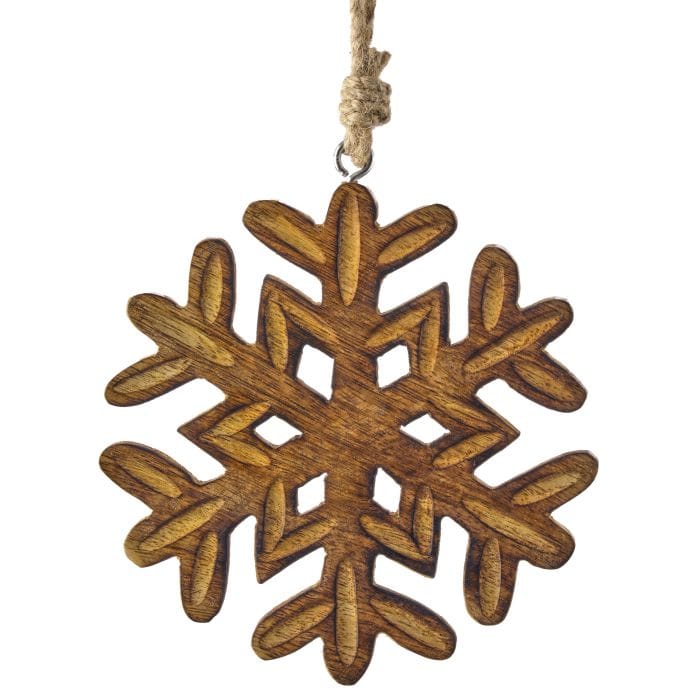Carved wooden snowflake ornament with intricate cutout design, hanging from twine cord