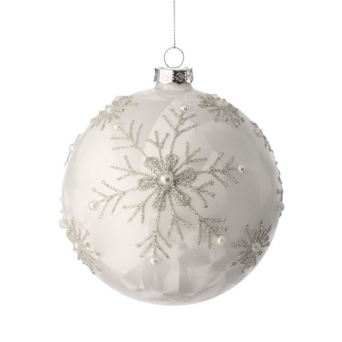 White glass ball ornament with silver glitter snowflake designs and pearl bead accents