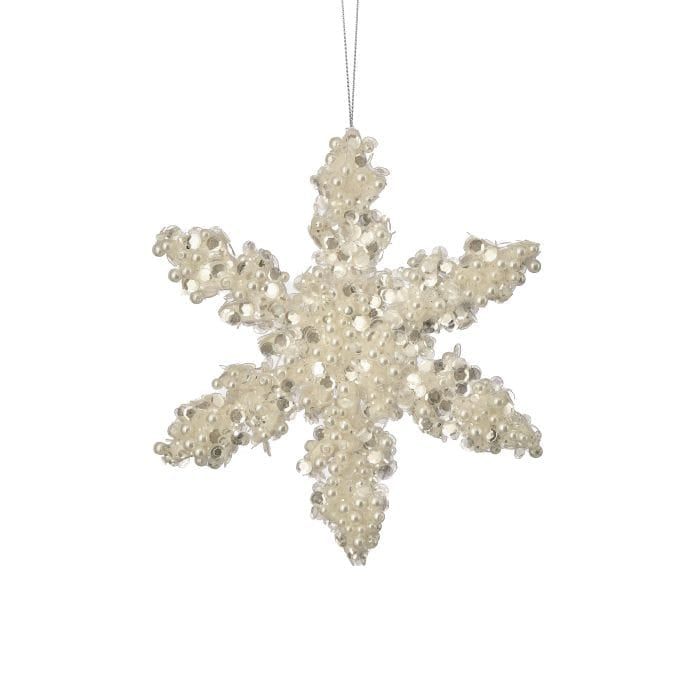 Six-pointed snowflake ornament covered in pearl beads and sequins, hanging on thin cord