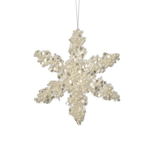 Six-pointed snowflake ornament covered in pearl beads and sequins, hanging on thin cord