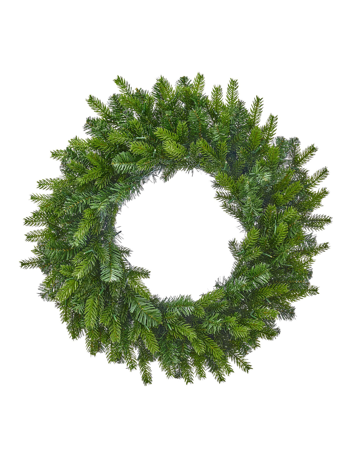Circular evergreen spruce wreath with layered pine branches, front view on white background