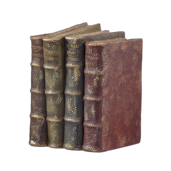 Set of four antique-style resin books with worn leather covers and gold text spines