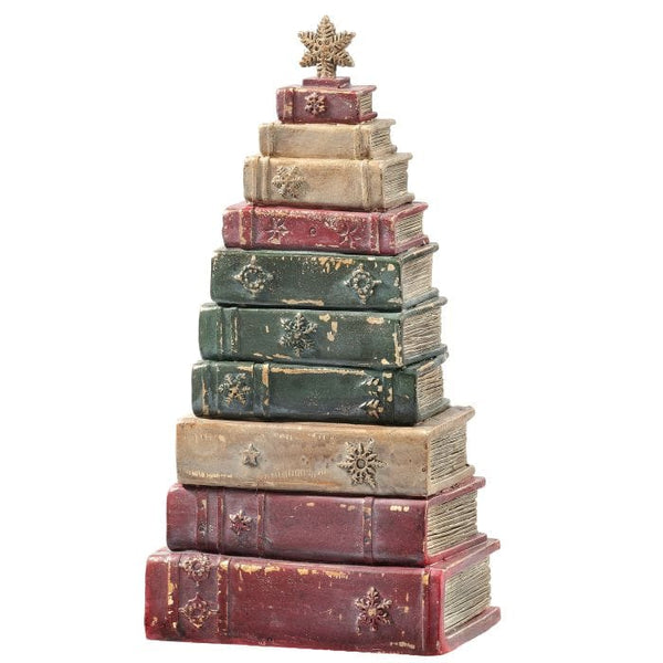 Stacked vintage-style resin books arranged as a Christmas tree with a snowflake star topper
