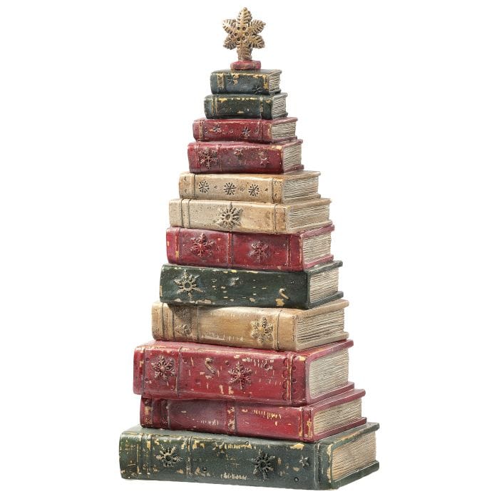 Christmas tree sculpture made of stacked vintage-style books with star topper, front view