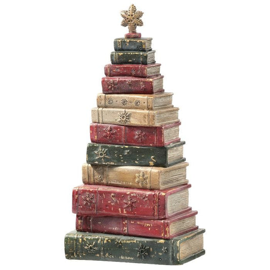 Christmas tree sculpture made of stacked vintage-style books with star topper, front view