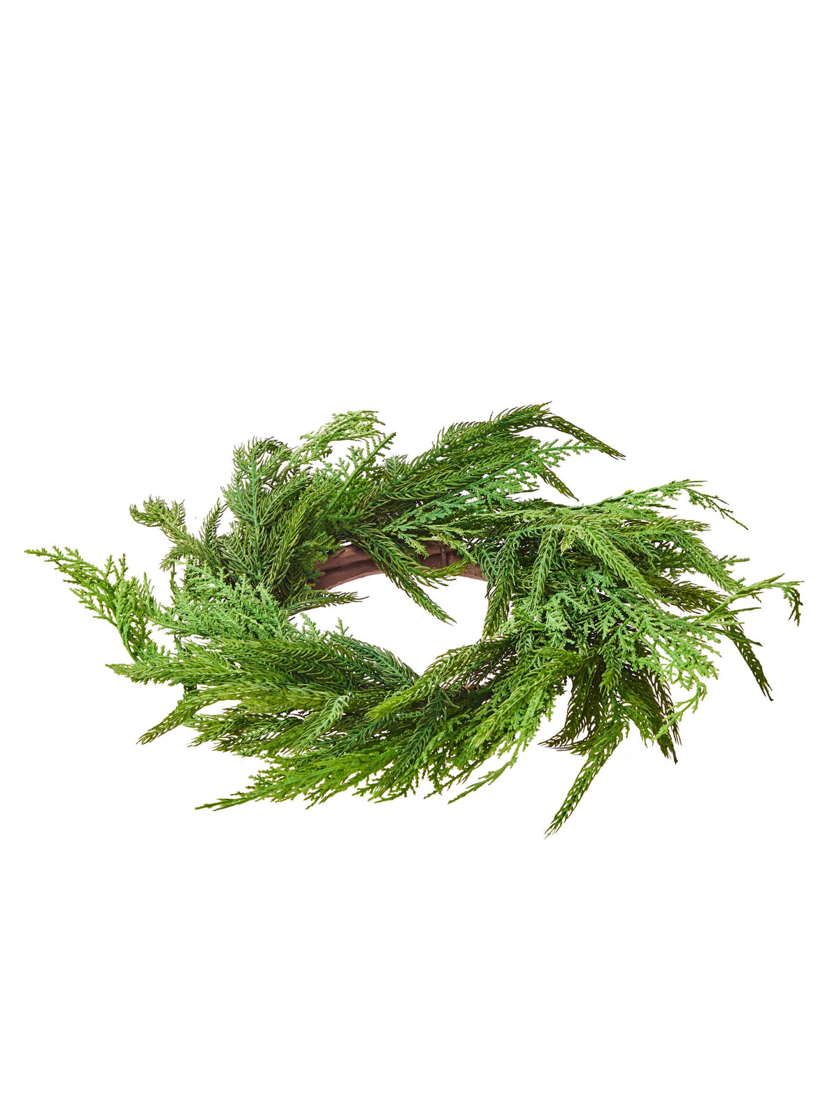 Circular evergreen candlering wreath with cedar and Norfolk pine sprigs on twig base, top angle view