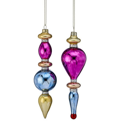 Two multi-section glass finial ornaments with reflective magenta, blue, and gold segments, hanging