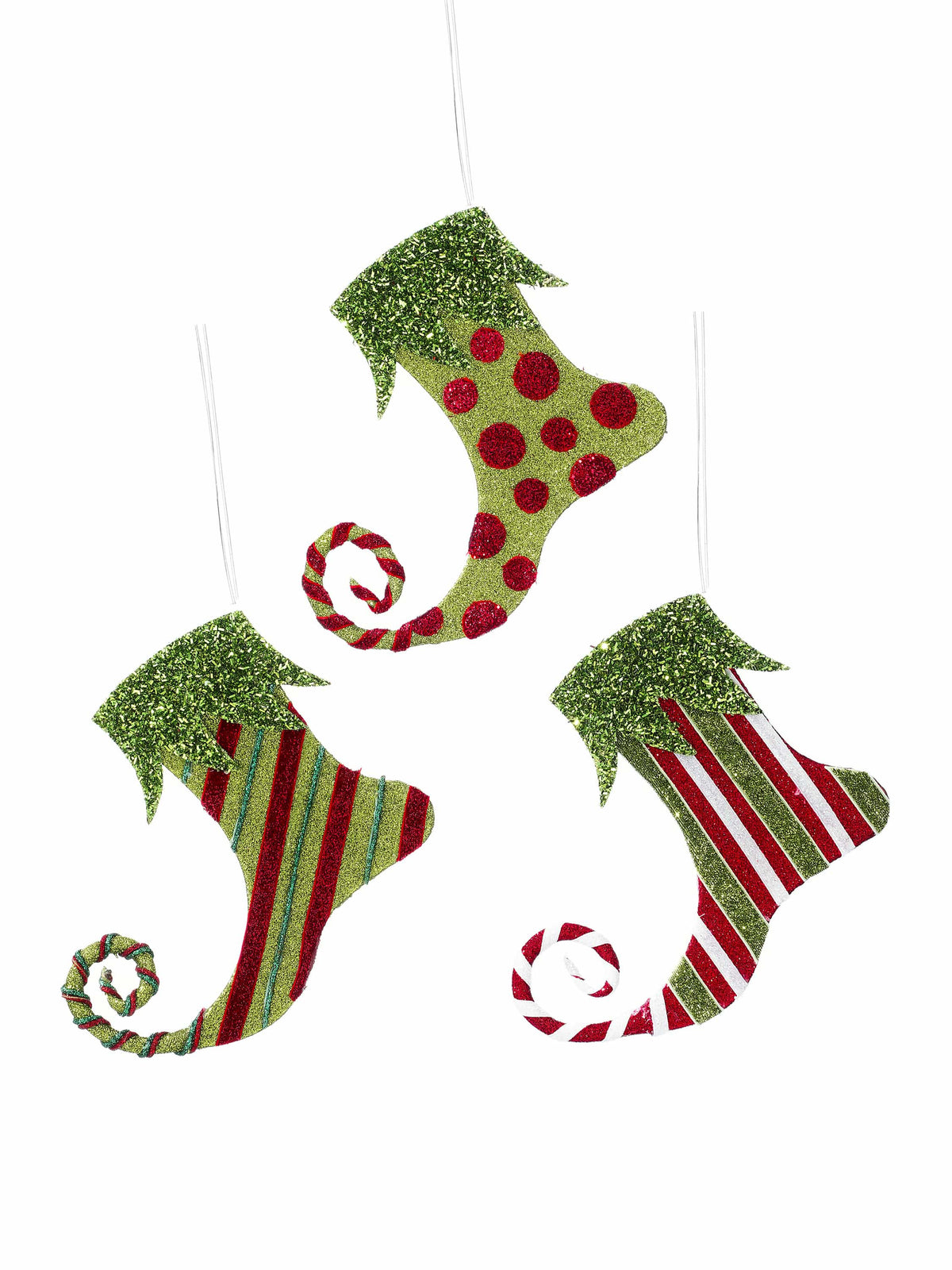 Three glitter elf boot Christmas ornaments in green and red with curled toes, hanging display