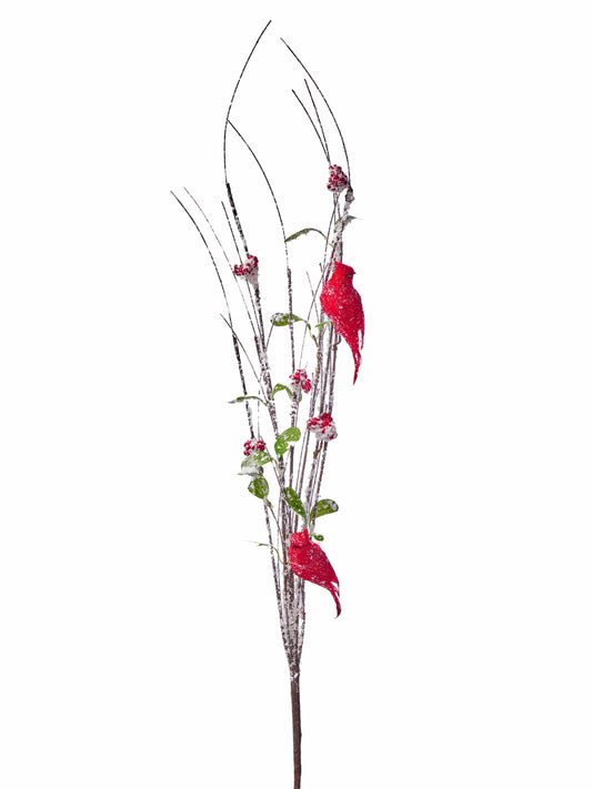 Snow-dusted decorative branch spray with two red cardinal birds and red berry clusters