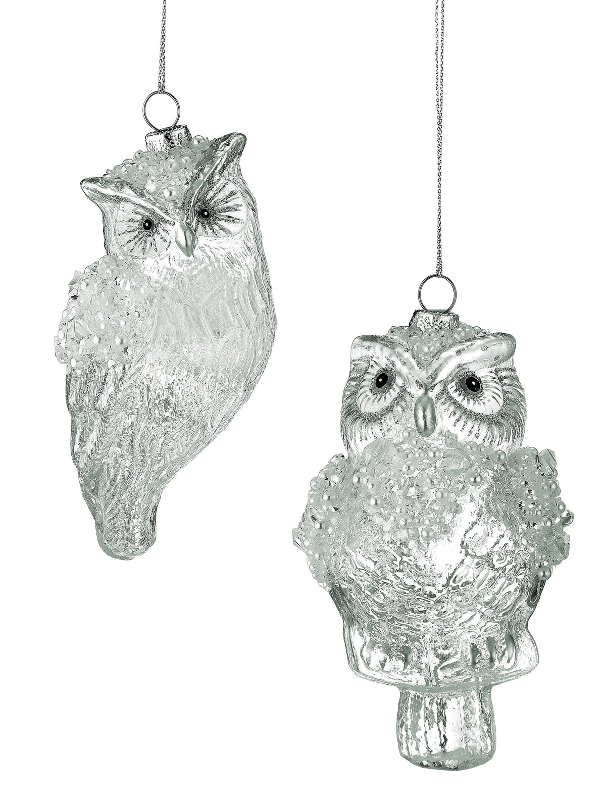 Two glass owl Christmas ornaments with ice-crusted beaded details and silver chain hangers