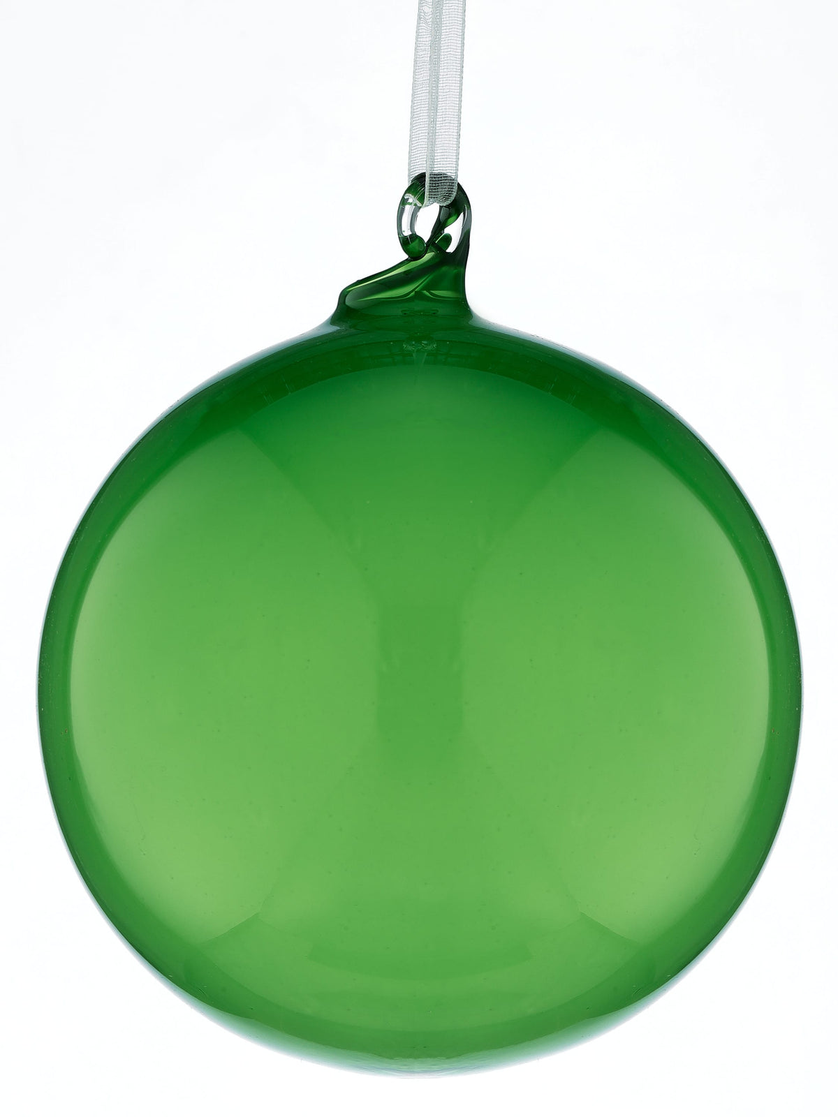 Shiny green glass ball ornament hanging from a white ribbon, front view