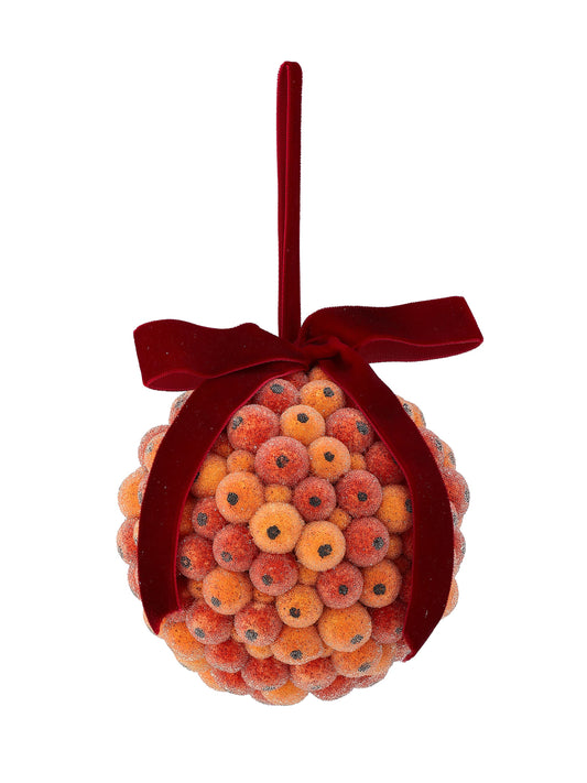 Spherical ornament covered in small orange beaded berries with dark centers, tied with a red velvet bow and hanging loop
