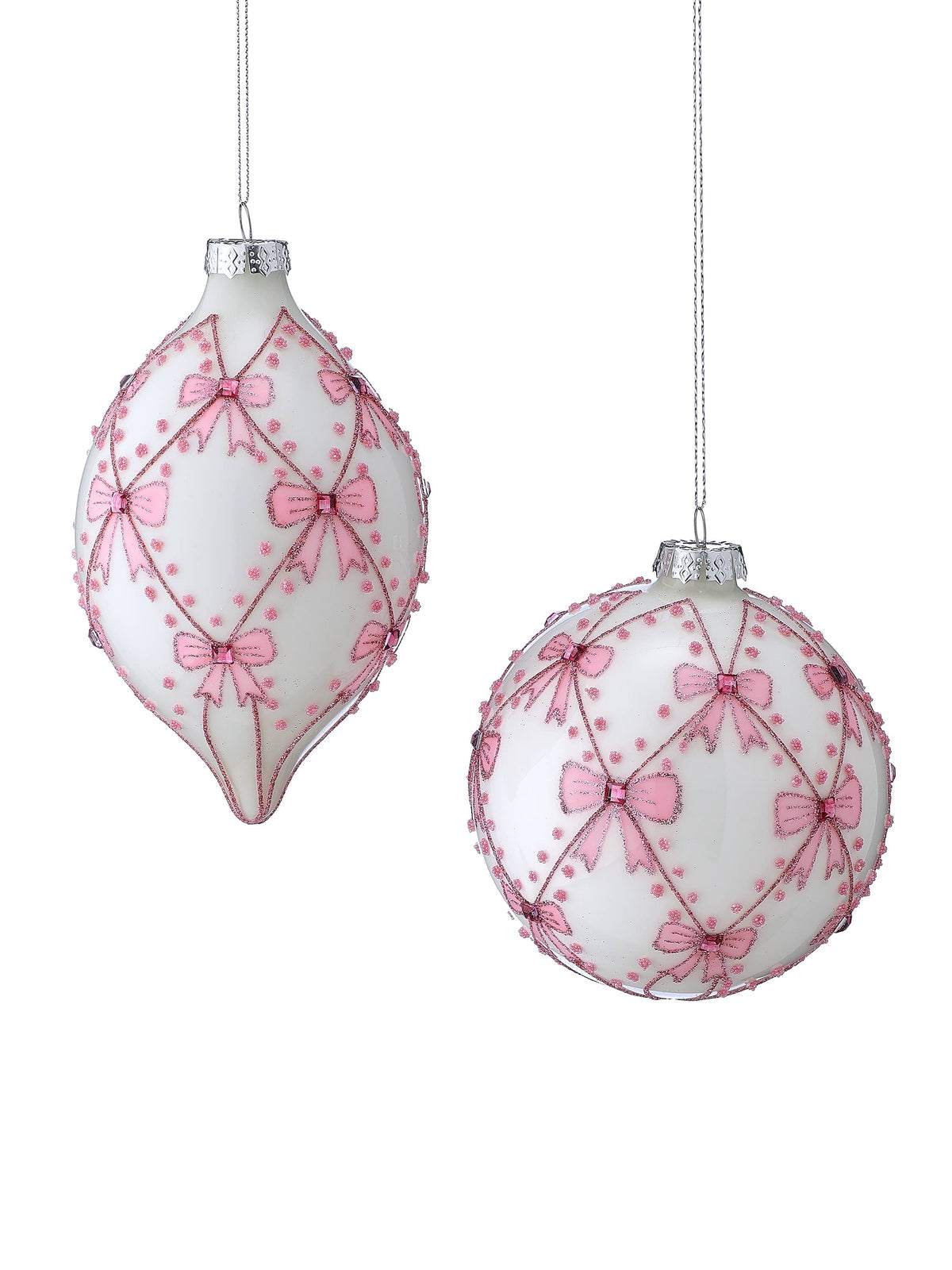White glass ornaments with pink bow and jewel lattice design, ball and finial shapes