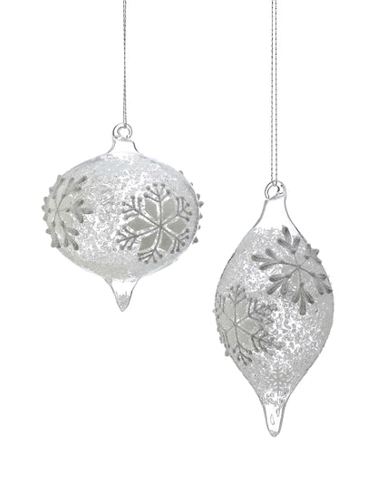 Two glass Christmas ornaments with silver snowflake designs: one round onion shape and one elongated finial