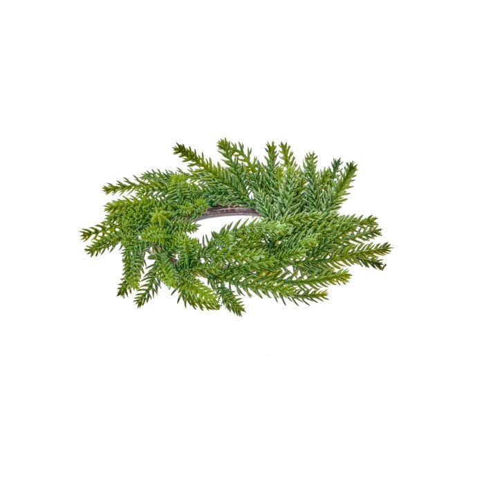 Small circular evergreen candle ring with fir branches radiating outward, top view
