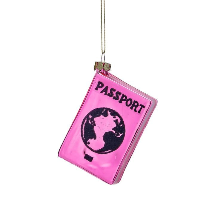 Pink glass passport-shaped Christmas ornament with globe design, hanging by gold string