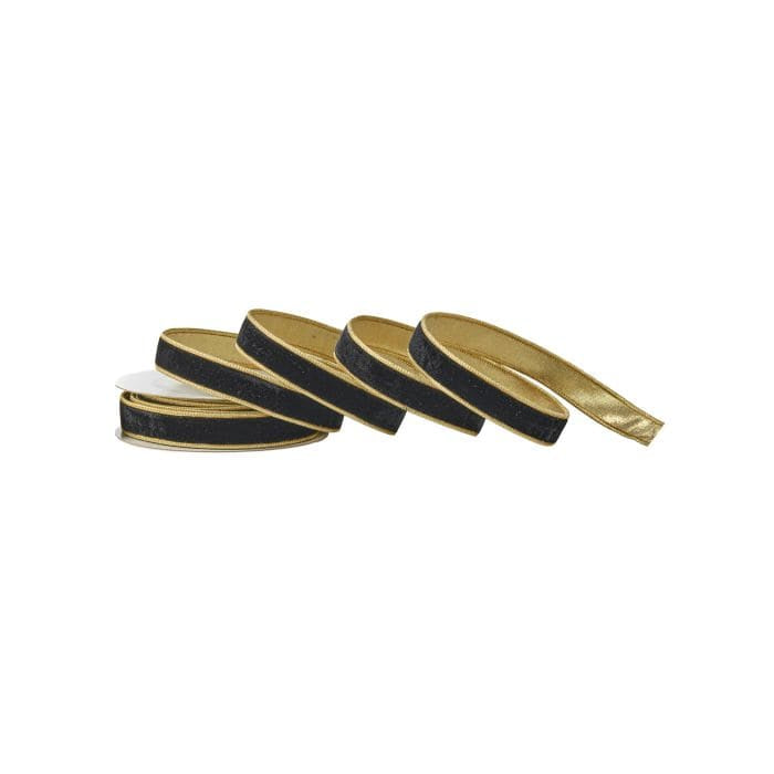 Multiple rolls of black velvet ribbon with gold metallic dupion backing, arranged in a row