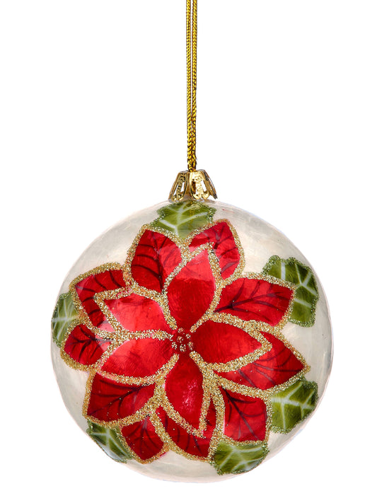 Round capiz shell ornament with red poinsettia flower, gold glitter trim, and green leaves, hanging view