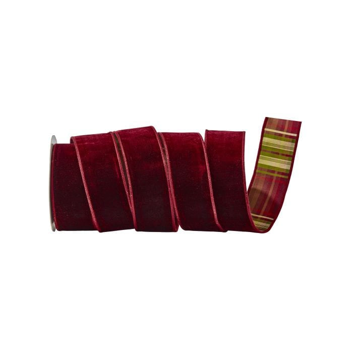 Rolled burgundy velvet ribbon with plaid-patterned reverse side visible at end