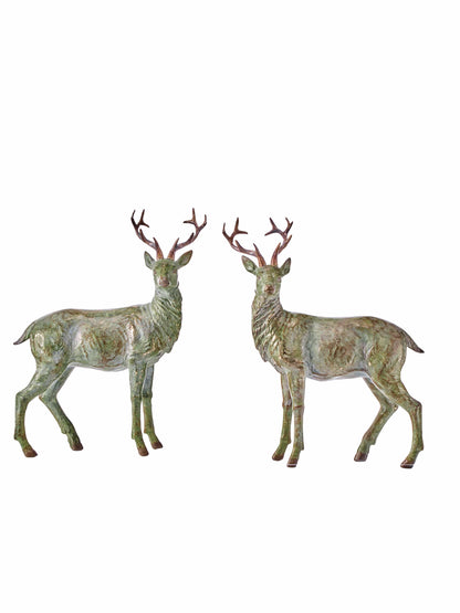Pair of resin antique-finish standing deer figurines with branched antlers, front view