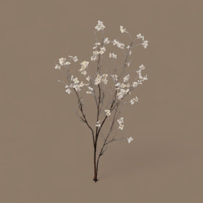 Tall decorative floral spray with cream dogwood blossoms on bare dark branches