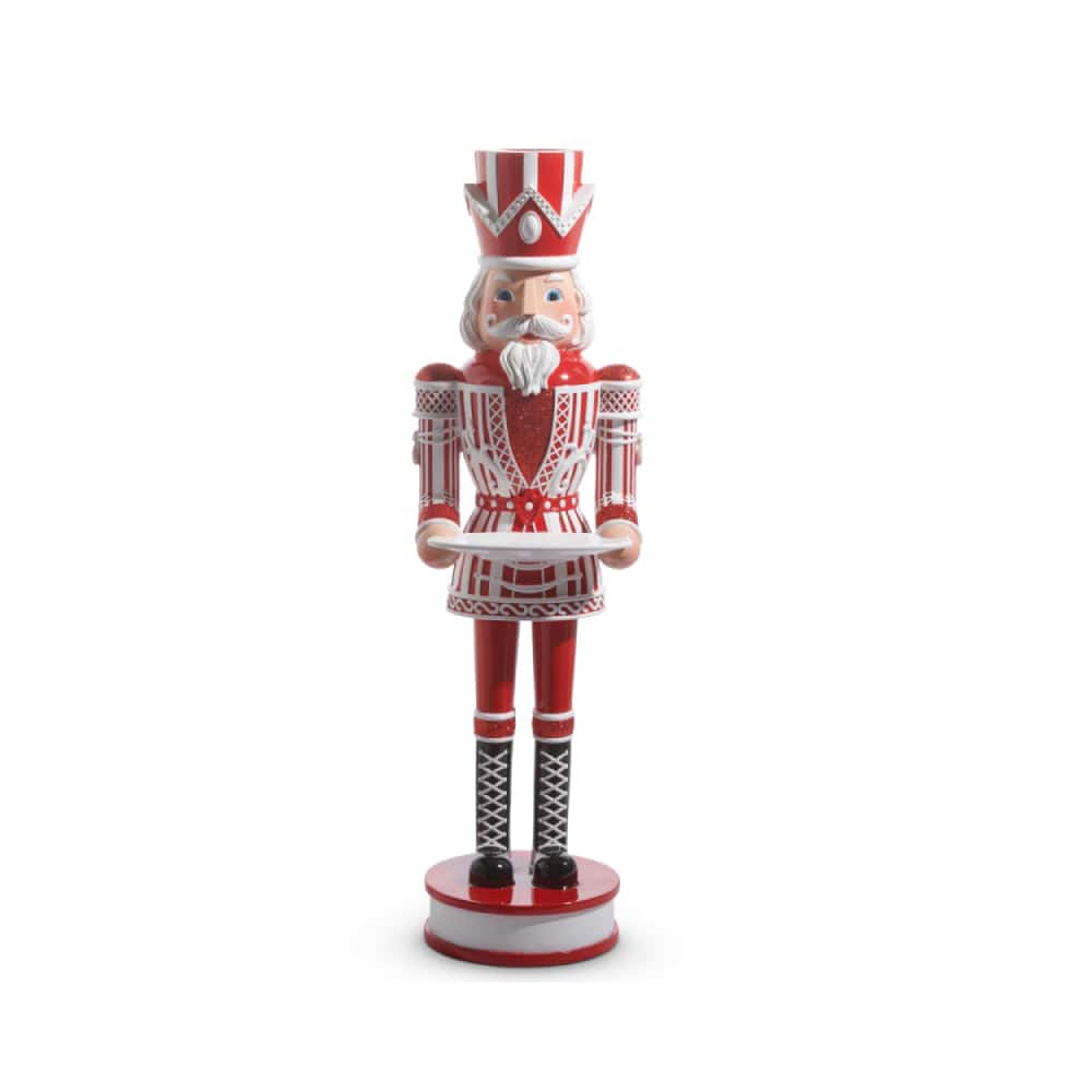 Tall decorative nutcracker figure in red and white uniform holding a serving tray, front view