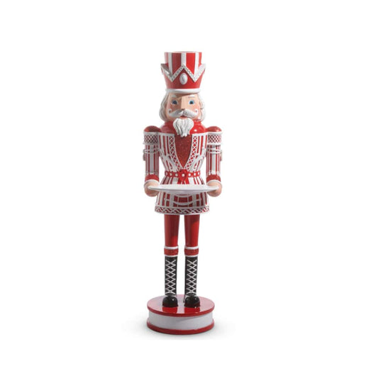 Tall decorative nutcracker figure in red and white uniform holding a serving tray, front view