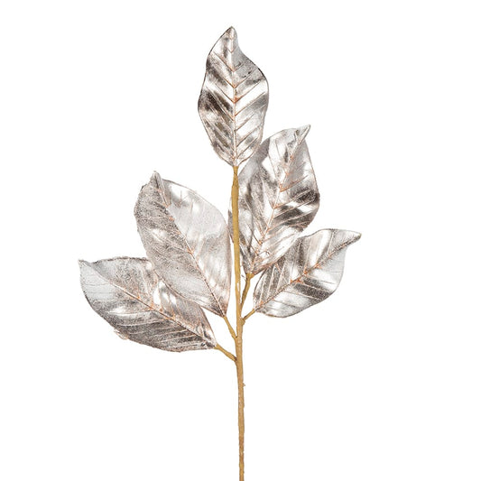 Metallic champagne magnolia leaf spray with six leaves on a natural stem