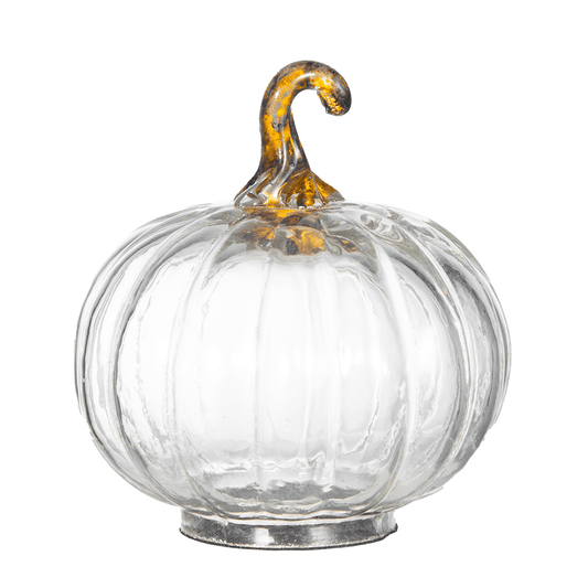 Clear ribbed glass pumpkin decoration with curved amber and dark stem, silver base