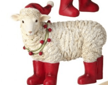 Resin sheep figurine in red Santa hat and boots with holiday garland