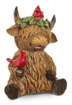 Brown highland cow ornament with red cardinal bird and holly on head