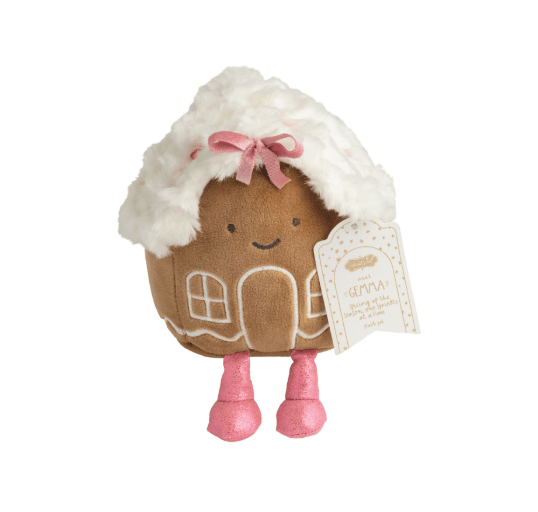 Mudpie gingerbread house plush with white fluffy roof, pink bow, and pink legs