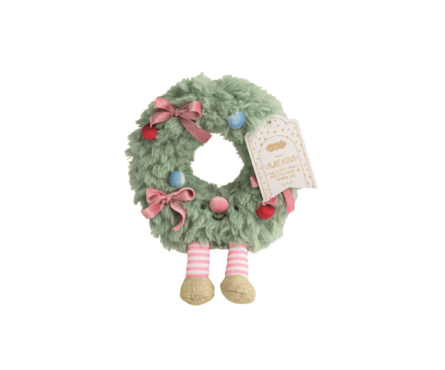 Mudpie green plush Christmas wreath stuffed toy with legs, bows, and colorful pom-poms