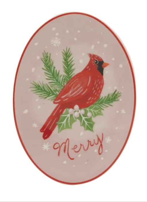 Oval stoneware dish with red cardinal, holly, pine branches, and Merry text