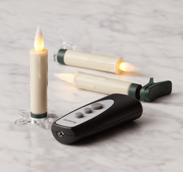 Ivory flameless LED clip candles with green holders and black remote control