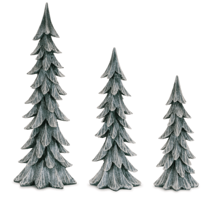 Set of three snow-dusted resin Christmas trees in graduated heights, green with white finish