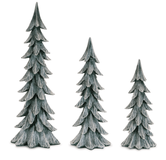 Set of three snow-dusted resin Christmas trees in graduated heights, green with white finish