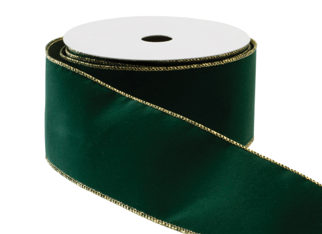 Emerald green velvet wired ribbon with gold trim edges on white spool